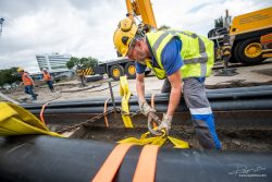 fotograaf-bouw-hijskraan-plaatst-zinker-12