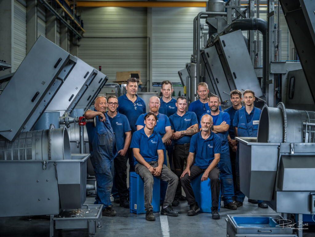 Of ik ook even een groepsfoto kon maken van deze enthousiaste vakmensen? Dat doe ik dan wel graag met de techniek er omheen!